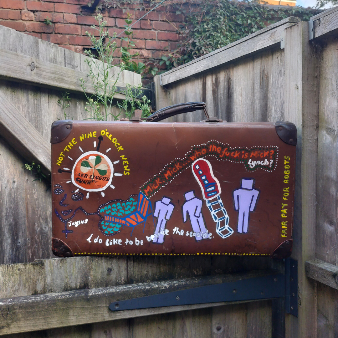 Hand painted vintage travel case referencing Mick Lynch and railways robotic age and Aer Lingus with vintage Aer Lingus sticker.