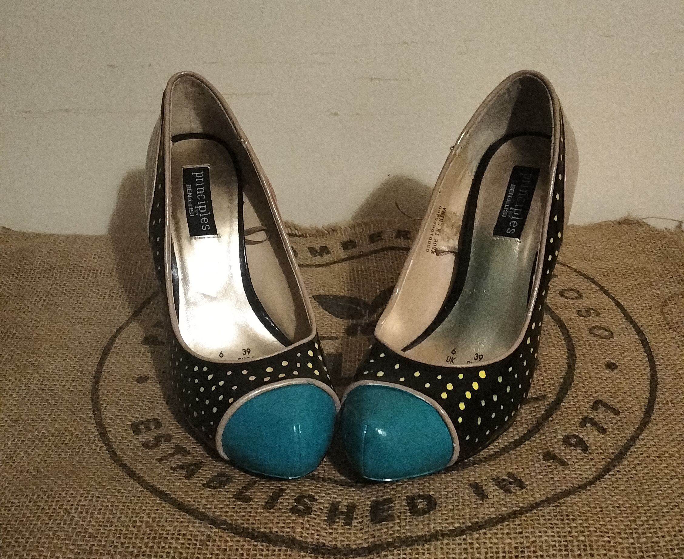 Size 6 hand painted Ben de Lisi shoes.  Turquoise toes, black sections with gold spots at the front and side.  Orange panels.  Beige shoes, stiletto heels.