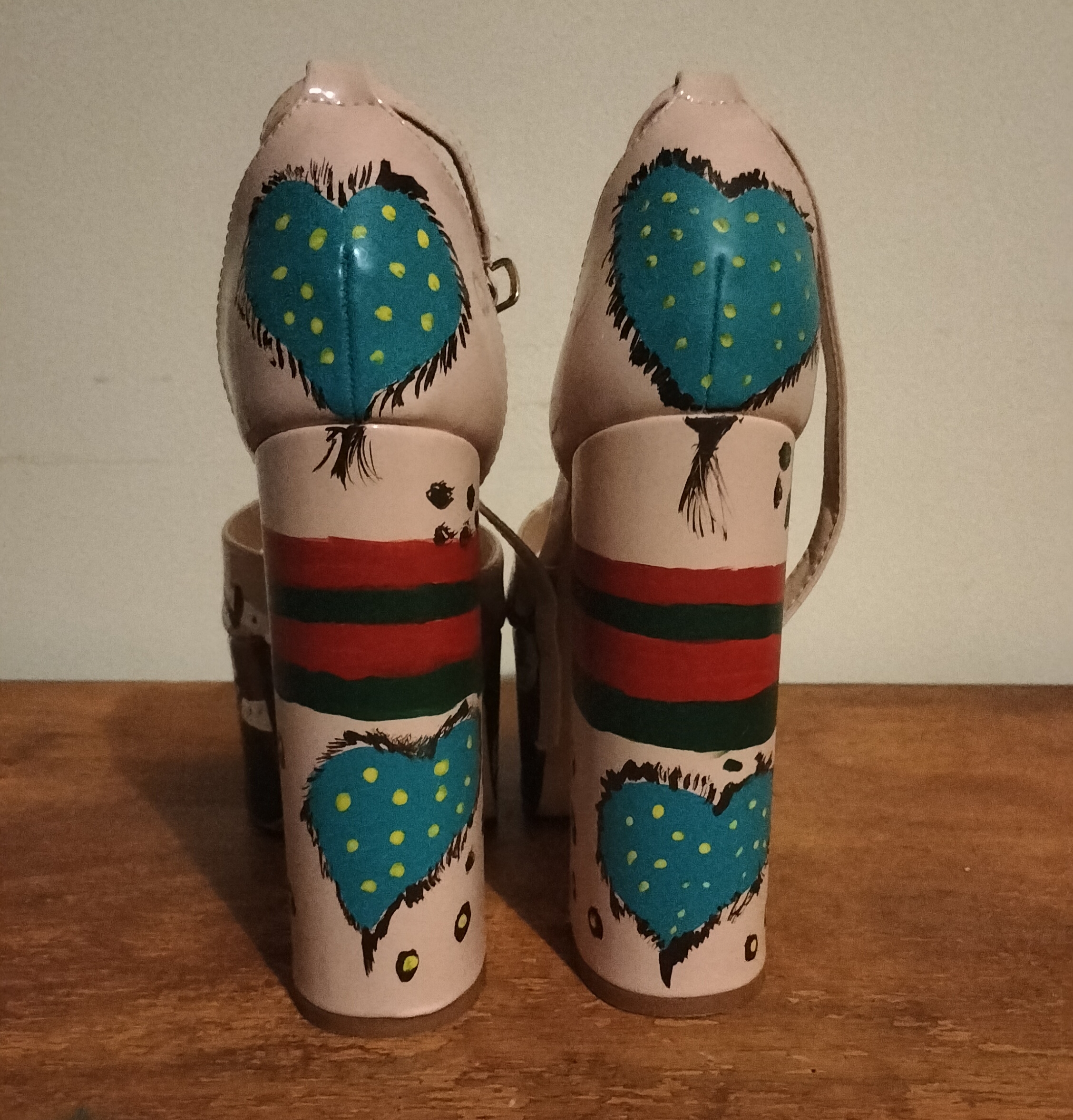 Hand painted size 8 platform shoes - the back - turquoise hearts spotty, red and green lines in the middle of the heels