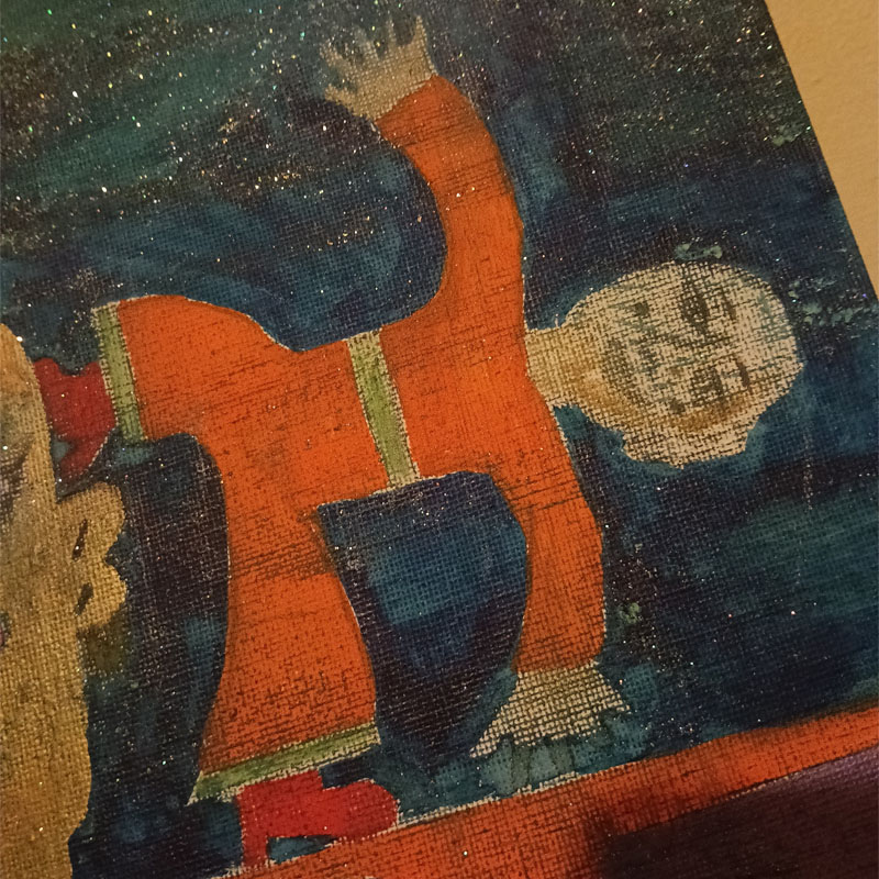 10"x12"canvas called the Orange Man. Large figure on the left holding a flower. Behind the figure is a sideboard and a smaller figure in some kind of yoga pose with one hand and one foot on the sideboard and the other foot and hand raised. There is a light at the top of the image. The smaller figure wears an orange jumpsuit. Blue background.