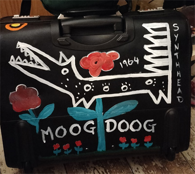 Design Moog Doog based on music gentre and the moog synthesizer. Character that I have created that has features on a cartoon-like dog that look like the knobs and buttons on a synthesizer. Links to Red Bubble account for digital design of Moog Doog too.