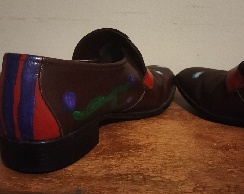Brown leather hand painted shoes. Back and inside of shoes