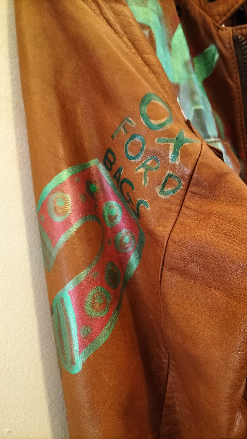 Liam's Old Coat - hand painted vintage parka jacket with hood (brown). Image on a sleeve. Reads Ox, next line - ford, next line - bags and trousers painted underneath. Vintage Rome Peabody Massachusetts USA Size 42 brown leather hooded parka jacket handpainted one off.