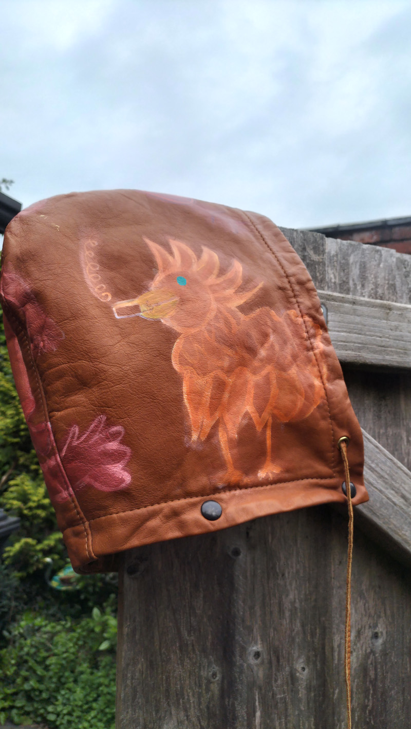 Liam's Old Coat - hand painted vintage parka jacket with hood (brown). Hand painted detachable hood. Image of a bird with cigarette in its mouth. Vintage Rome Peabody Massachusetts USA Size 42 brown leather hooded parka jacket handpainted one off.