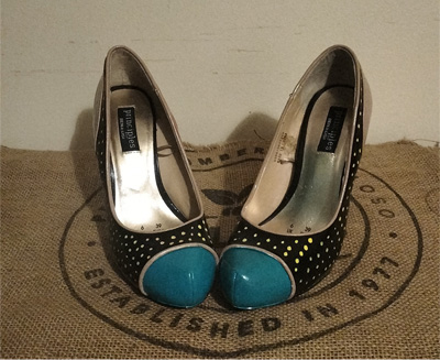 Ben de Lisi size 6 hand painted shoes. Main colour beige and painted with orange and turquoise colours with yellow dots. Sections of the shoes are painted. Stiletto heel. Original one-offs. Turquoise toe with black section behind with yellow spots. Orange panels on the inside of the shoes which extends to the back of the shoe around the top of the shoe.