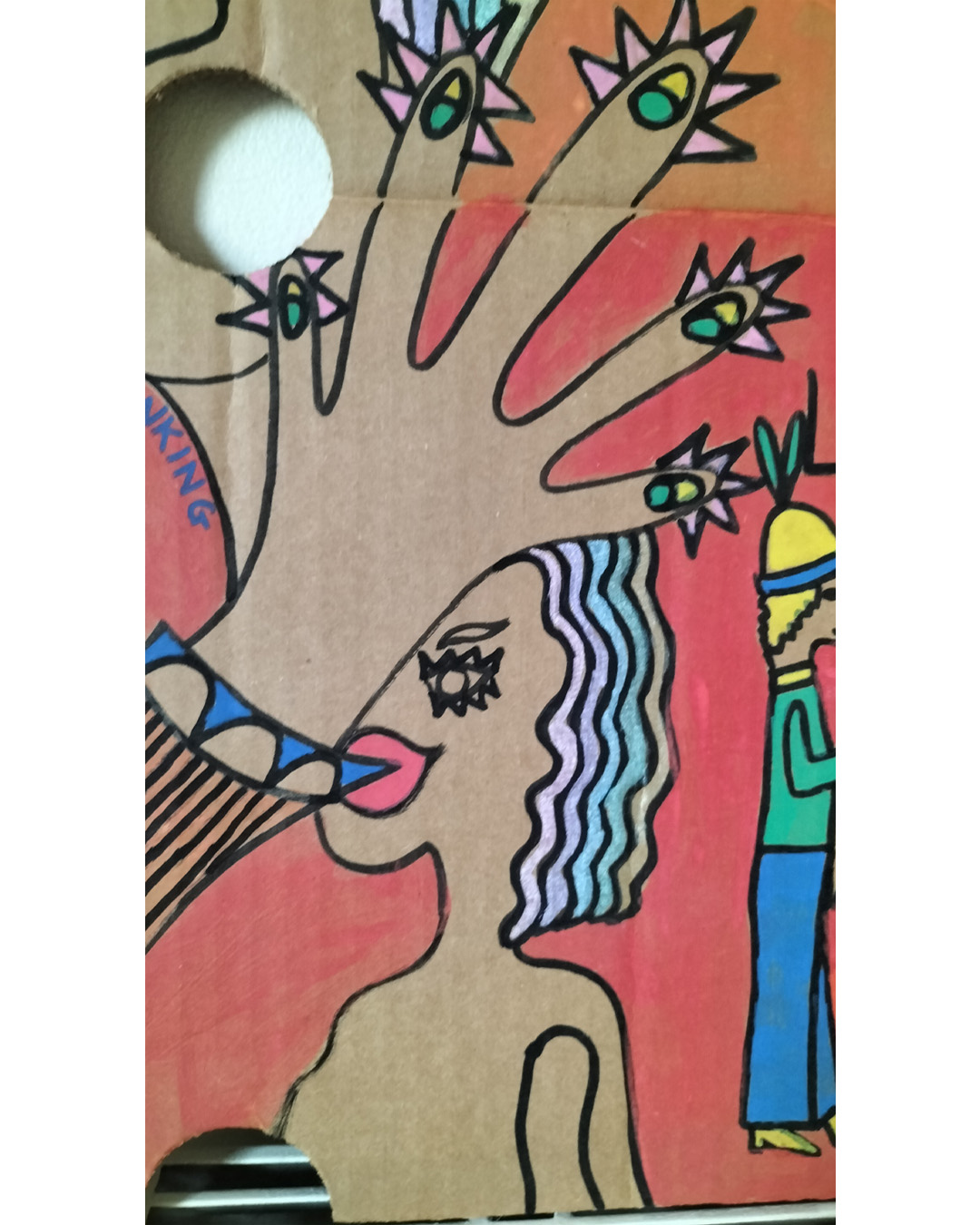 Close up of hand and woman below it. The Locarno cardboard art about A3 in size. The Locarno was a nightclub in Birmingham and there were Locarno nightclubs across England. This is a scene with a woman's face in top left of cardboard where a hole is her mouth and the words Uptown Top Ranking run under her hairline and around her chin and neck. The hand of the woman is coming up from the bottom left of the cardboard and the fingers are extended and look like chickens with spikey hair and a beak around each finger and the nail looks like an eyeball with eyelid (not detailed). There is the words The Locarno on the piece and a man and woman standing talking at a tall table. There is another woman under the hand where you only see part of her face. To the right of the image is a doorway and it looks like inside a room with slabs for stairway leading there. This is only small on the right side of the cardboard. Background is pink for the bottom two thirds of the cardboard and a kind of orange for the top third of the card.