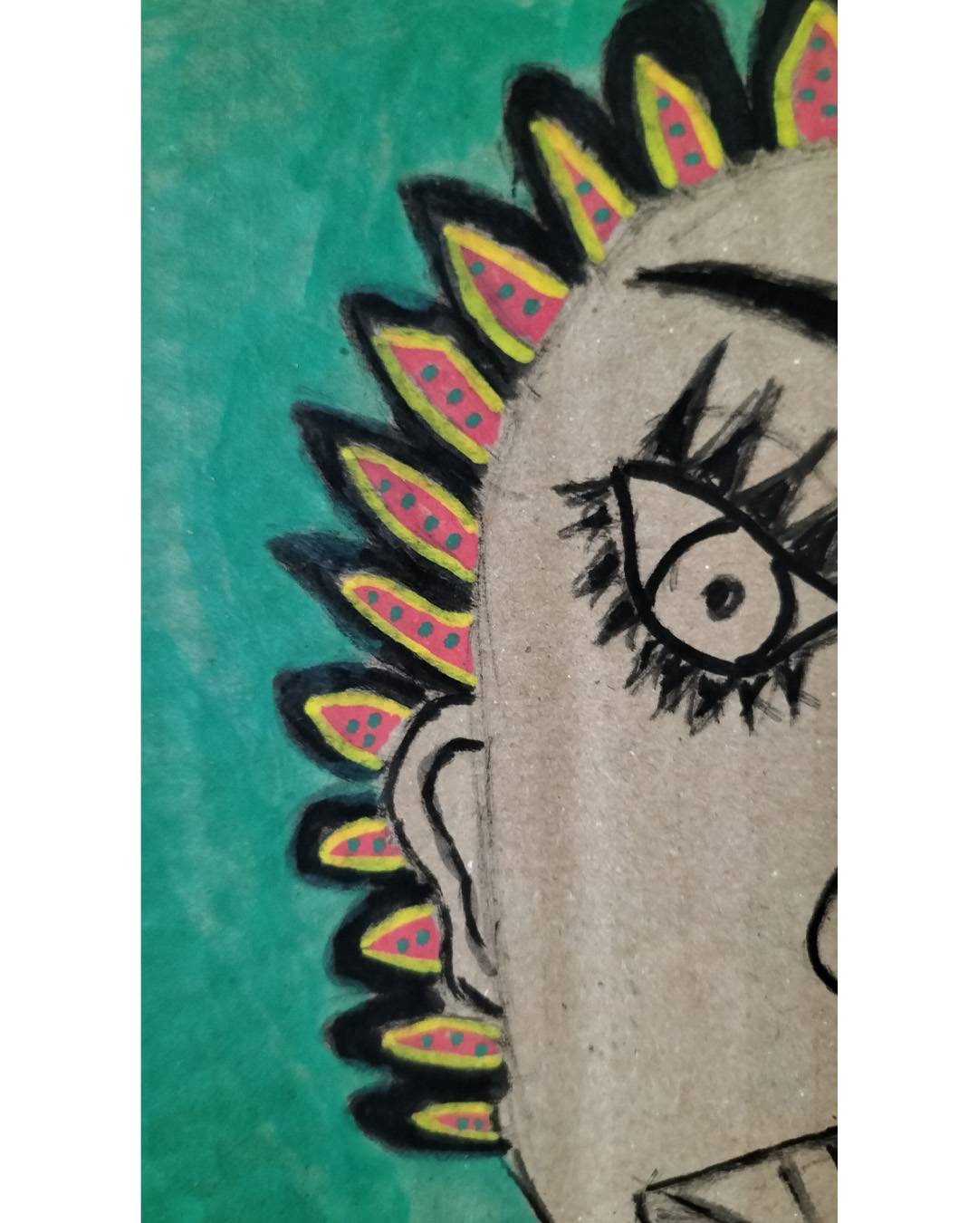 One-off art work on A3 cardboard. Green background. Black woman on the left of the image. Pink top. Hair in individual almond shapes around the head with black surround yellow and red inside with green dots. Purple and yellow bird on the woman’s shoulder. Lots of space to the right of the image.