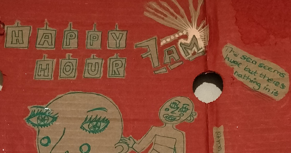 Happy hour cardboard art. Close up on words Happy hour and 7am. Also the words "The sea seems huge but there's nothing in it." to the right of the art work.