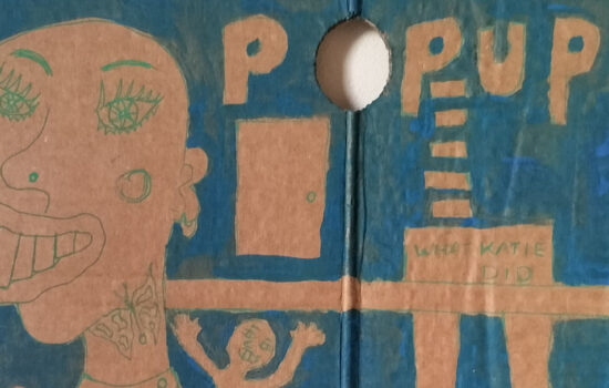 What Katie did cardboard art. A3. Large figure on left lifting a weight. Bald head. Quirky drawing. Small figure on shoulder waving. Could be alter ego, could be a memory or that little niggling thought. Image has a horizontal strip across it, not high. On the right of image lower half of woman's body. Reads "What Katie did" on the area for pants and below legs with ankle high bootgs/shoes. Reads Pop Up above and a hole in the cardboard where the O is. There a door above the line too. Blue backgound and figure and drawing do not have any colour inside, just outlines. One-off.